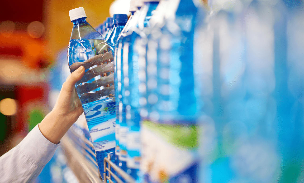 An eco-friendly scene, such as reusable items like water bottles and shopping locally.